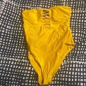 Never worn one piece